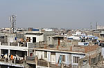 Photo of cell phone towers on the sky line of Old Delhi
